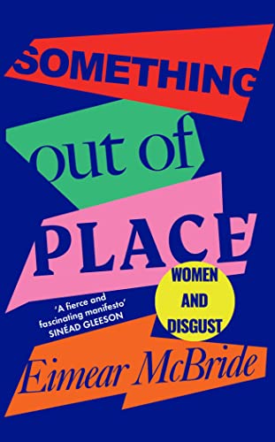 Book cover with title text on colorful geometric shapes against a dark blue background.