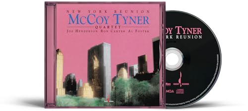 CD cover for McCoy Tyner Quartet New York Reunion showing city skyline against pink sky.