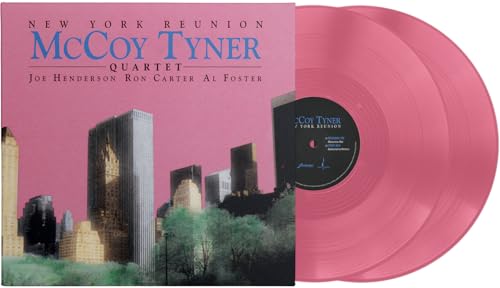 Pink vinyl record and album cover featuring a New York City skyline.