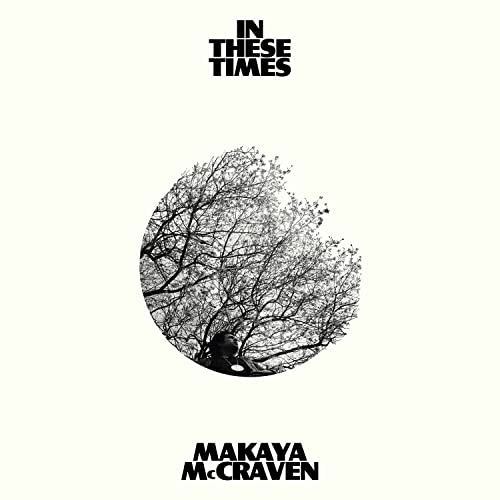 Album cover for Makaya McCraven’s “In These Times” featuring a tree silhouette.