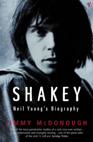 Book cover featuring a moody, dark-toned portrait of a young Neil Young.