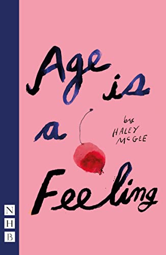 Book cover with pink background, black handwritten text, and a small red cherry illustration.