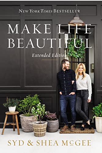 Book cover featuring a couple standing in a doorway with plants.