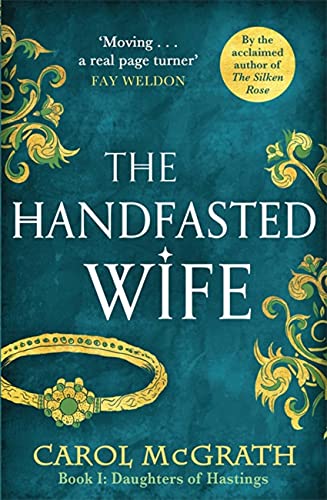 Book cover: "The Handfasted Wife" by Carol McGrath, with ornate gold details.