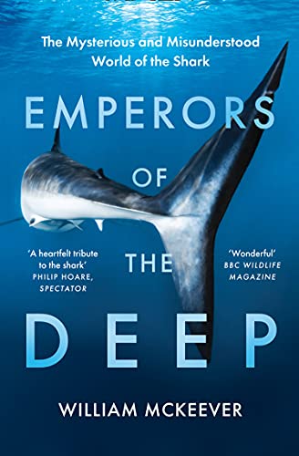 Book cover featuring a great white shark swimming in blue water.