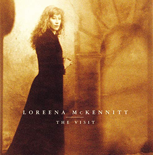 Sepia-toned portrait of Loreena McKennitt in a long black dress.
