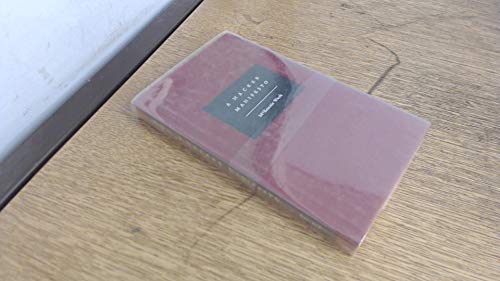 A copy of A Hacker Manifesto by McKenzie Wark wrapped in clear plastic on wood.