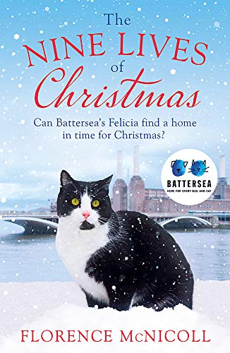 Book cover featuring a black and white cat with a snowy background.
