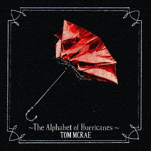 Red origami hurricane shape against a black background, album cover art.