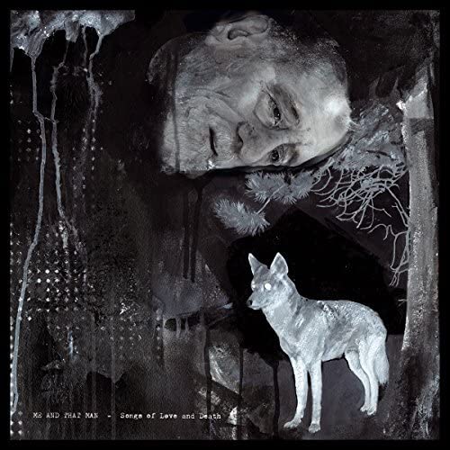Black and white album cover with a wolf and a man's head.