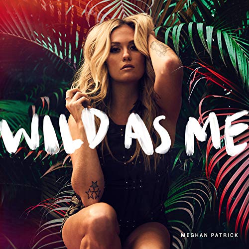 Album cover for Meghan Patrick’s “Wild As Me” featuring a woman in foliage.
