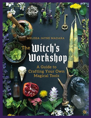 Book cover with magical tools, plants, skull, and candles arranged around text.
