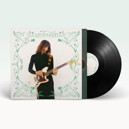 Vinyl record and album cover featuring a woman playing guitar.