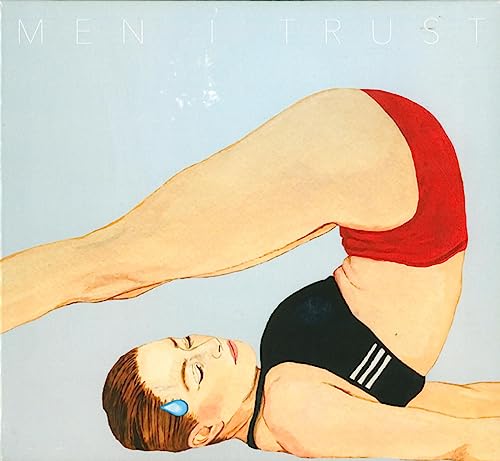 CD cover: woman in athletic wear doing a backbend against blue.