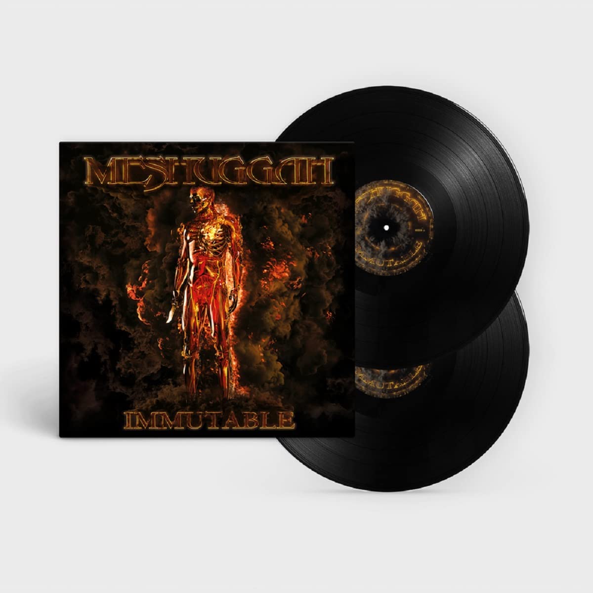 Meshuggah’s “Immutable” album cover: fiery, anatomical figure against a dark background.