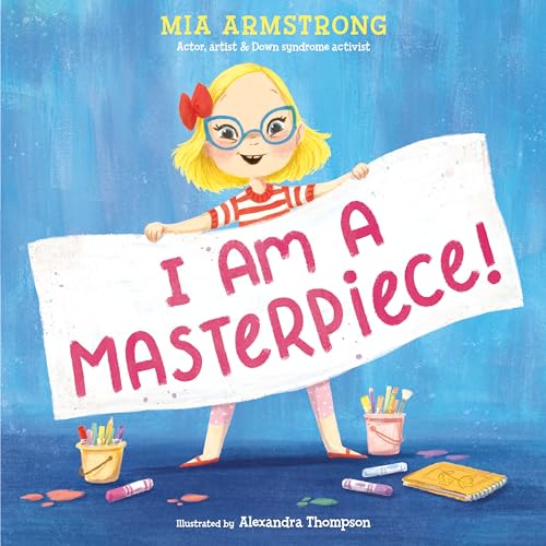Girl with blonde hair holds a sign reading “I AM A MASTERPIECE!”