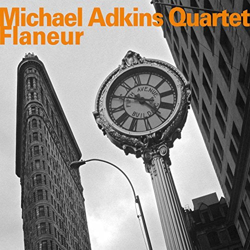 "Album cover with black-and-white cityscape, clock, and orange title text."
