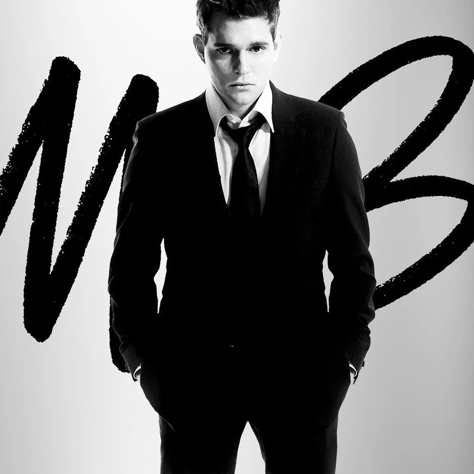 Black and white portrait of Michael Bublé in a suit, album cover.