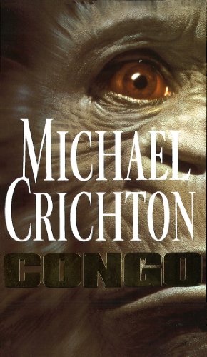 Book cover: gorilla eye and the author name Michael Crichton.