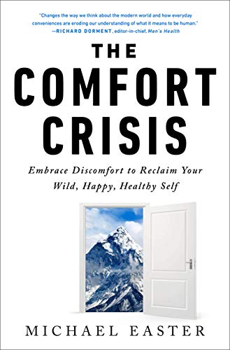 Book cover titled The Comfort Crisis with an open door revealing a snowy mountain.