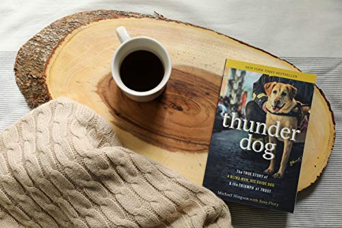 Book cover of “Thunder Dog” with a coffee cup and knitwear.