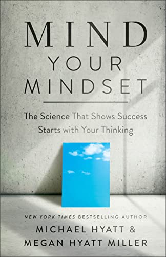 Book cover titled Mind Your Mindset with a blue sky image on concrete background.