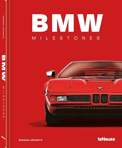 Red BMW car on cover of “BMW Milestones” book.