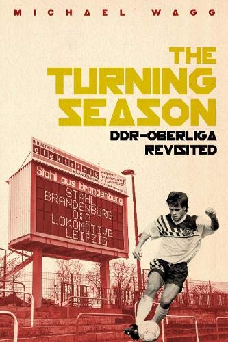 Book cover: soccer player with scoreboard in the background.