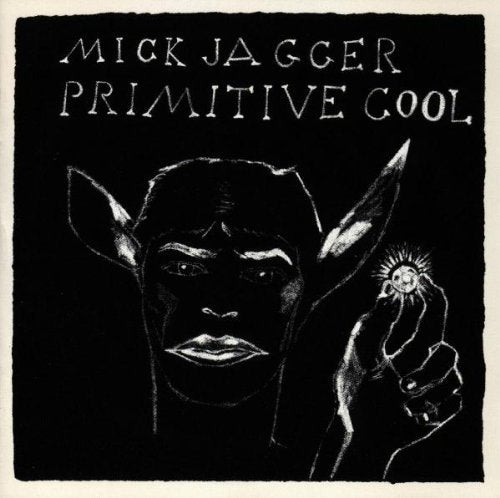 Mick Jagger's "Primitive Cool" CD cover: black and white portrait with deer antlers.