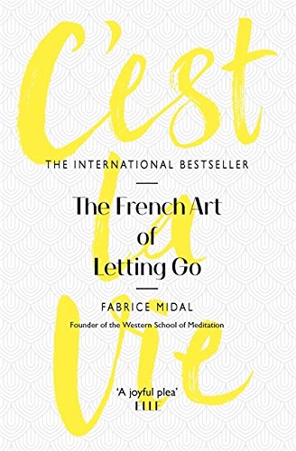 Book cover with yellow cursive text, “C’est La Vie,” on a white patterned background.