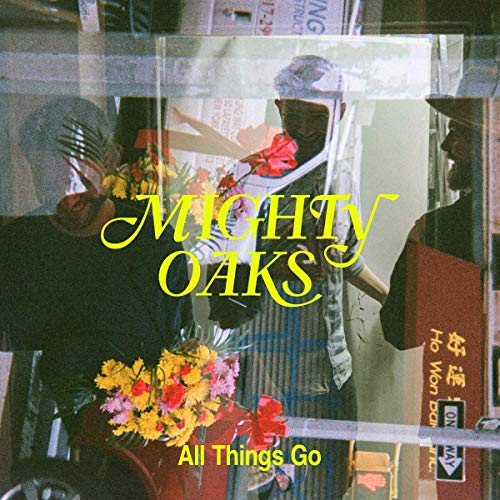 Vinyl cover showing a person holding flowers with yellow text overlay Mighty Oaks.