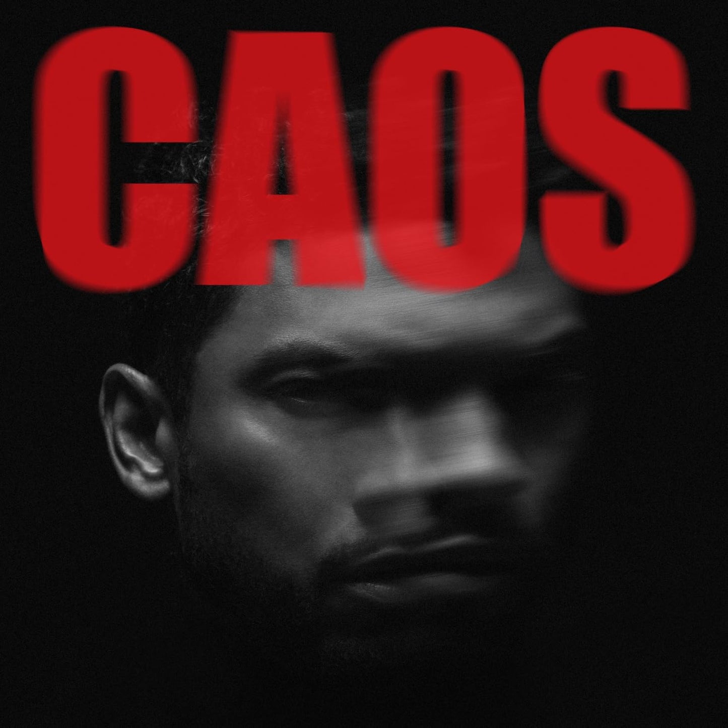 Vinyl album cover for Miguel’s “Caos” featuring a portrait of the artist.