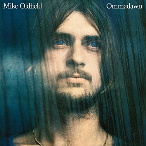 Album cover for Mike Oldfield’s “Ommadawn” featuring a portrait of a man.