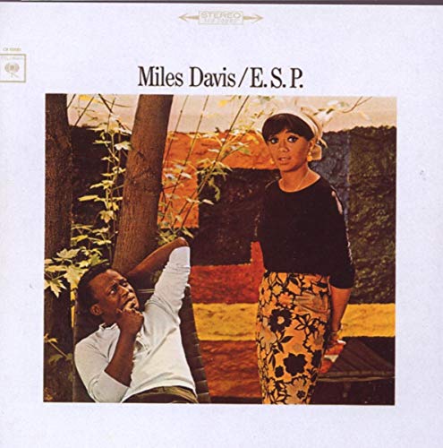 Album cover for Miles Davis’ “E.S.P.” featuring a couple in a garden.