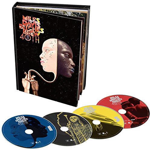Miles Davis Bitches Brew 40th Anniversary box set with four colorful music CDs.