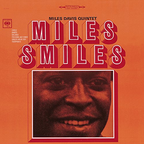 “Miles Smiles” album cover featuring Miles Davis’ portrait in orange and red.