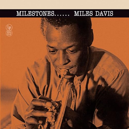 Album cover featuring a portrait of Miles Davis playing the trumpet in orange tones.