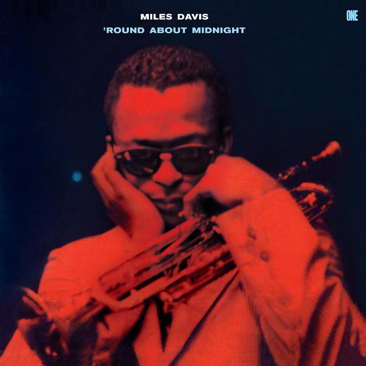 Miles Davis portrait on album cover, playing trumpet with red lighting.