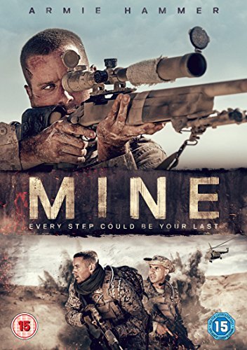 Armie Hammer aims a sniper rifle on the DVD cover for the film Mine.