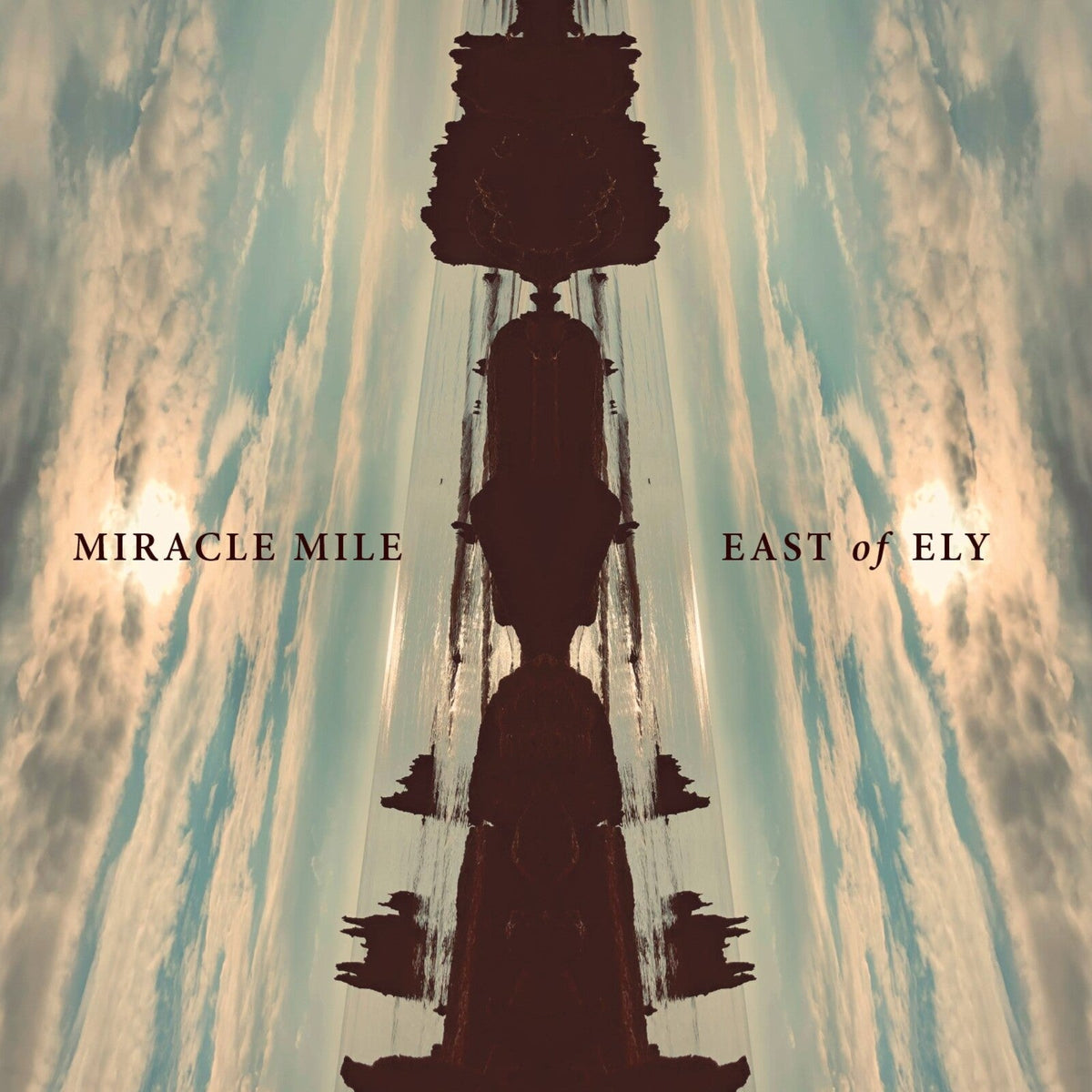 CD cover for Miracle Mile’s “East of Ely” with a silhouetted structure.