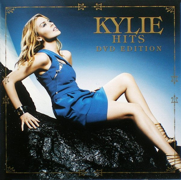 Kylie Minogue reclines in blue dress on DVD cover.