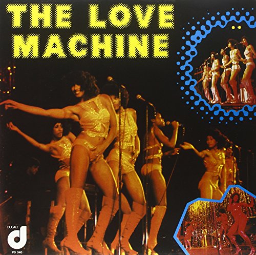 1970s album cover featuring dancers in gold outfits performing onstage.