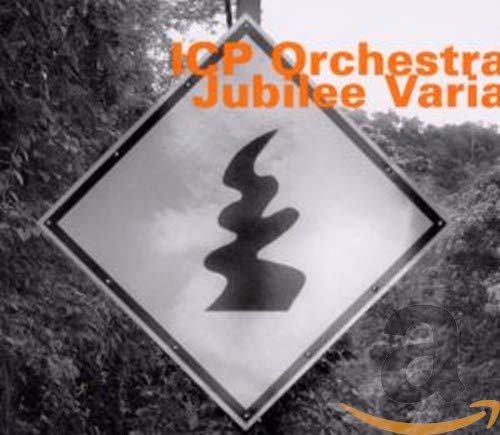 CD cover: diamond-shaped sign with orange text and abstract black shape.