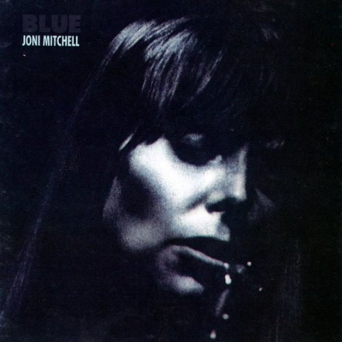 Joni Mitchell’s “Blue” album cover: a dark, close-up portrait.