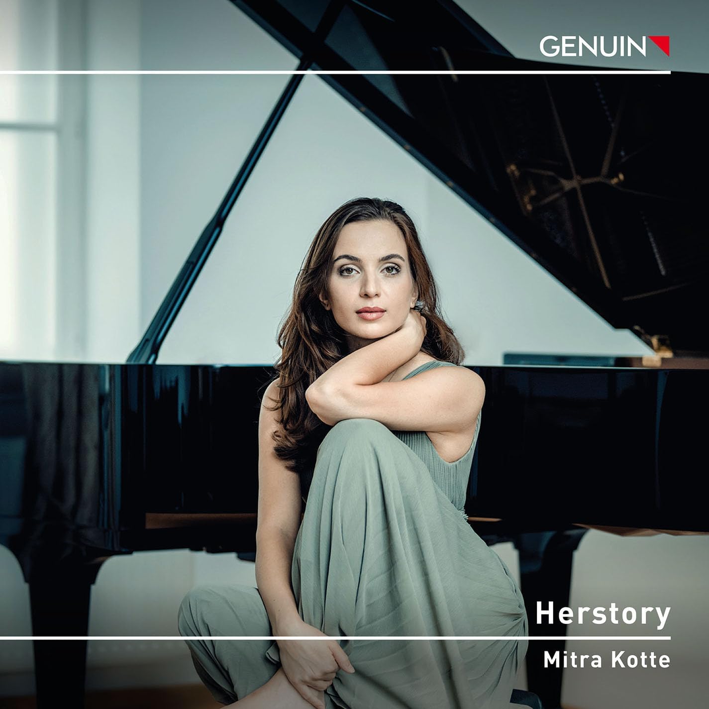 Woman sitting by a grand piano, album cover for “Herstory” by Mitra Kotte.