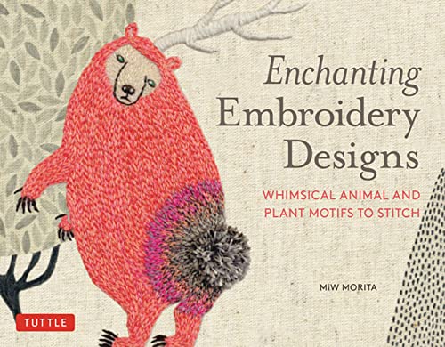 Book cover featuring an embroidered pink bear with a pom-pom tail on linen fabric.