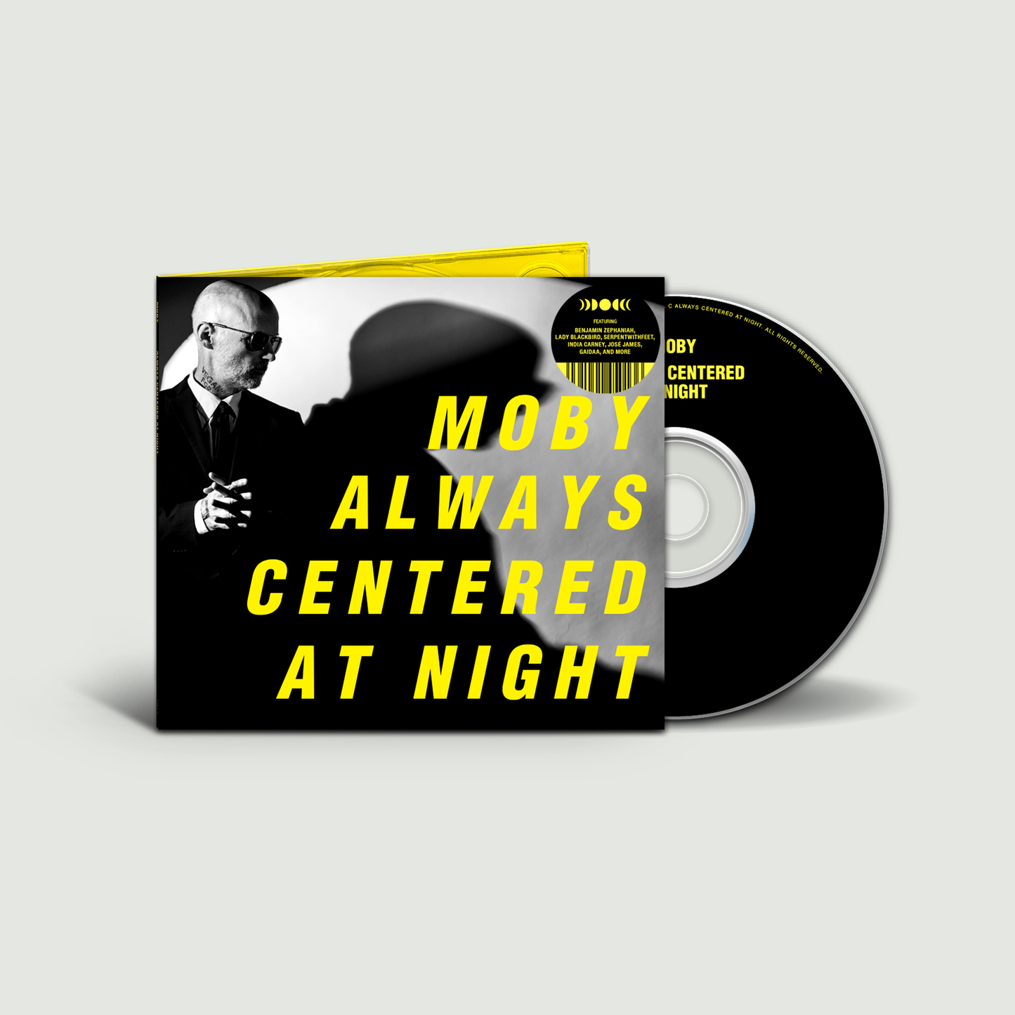 Moby album "Always Centered At Night" CD with yellow cover and disc.