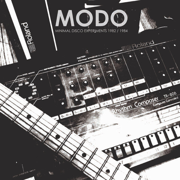 Black and white album cover featuring a Roland TR-808 and guitar fretboard.