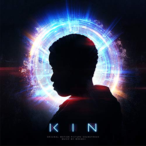 Silhouette of a person’s profile against a bright, swirling blue and white light.