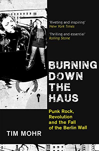 Book cover featuring a black and white photo of punk musicians against text.